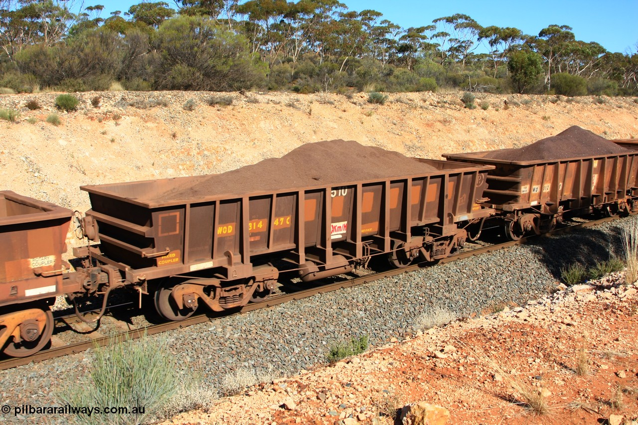 100602 8544
WOD type iron ore waggon WOD 31447 is one of a batch of sixty two built by Goninan WA between April and August 2000 with serial number 950086-019 and fleet number 510 for Koolyanobbing iron ore operations with a 75 ton capacity and a build date of 05/2000, for Portman Mining to cart their Koolyanobbing iron ore to Esperance, with the letters now painted over, loaded with fines ore just west of Binduli, 2nd June 2010.
Keywords: WOD-type;WOD31447;Goninan-WA;950086-019;