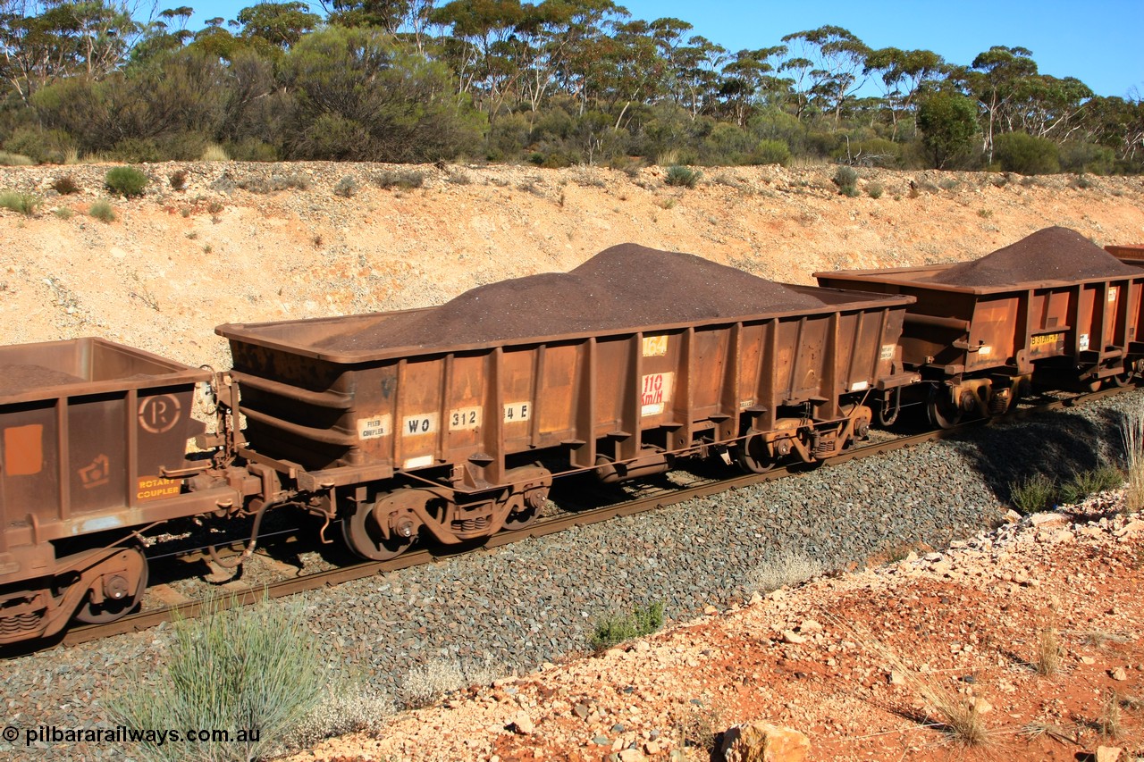 100602 8545
WO type iron ore waggon WO 31284 is one of a batch of eighty six built by WAGR Midland Workshops between 1967 and March 1968 with fleet number 164 for Koolyanobbing iron ore operations, with a 75 ton and 1018 ft³ capacity, seen here loaded with fines west of Binduli, 2nd June 2010.
Keywords: WO-type;WO31284;WAGR-Midland-WS;