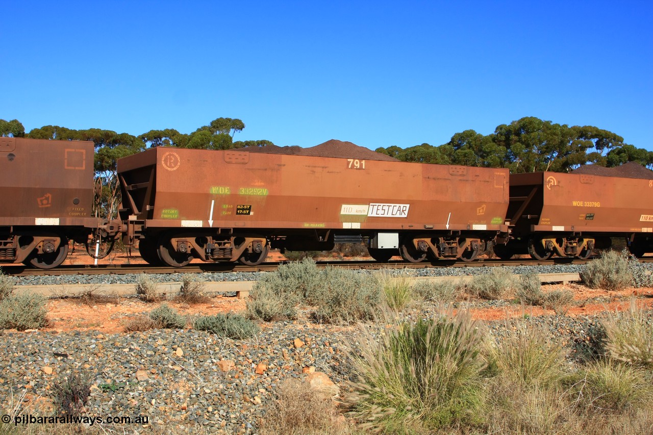 100602 8589
WOE type iron ore waggon WOE 33292 is one of a batch of thirty five built by United Goninan WA between January and April 2005 with serial number 950104-032 and fleet number 791 for Koolyanobbing iron ore operations, set up as a test car, build date of 04/2005 with a revised load of 82.5 tonnes and PORTMAN painted out, seen here west of Binduli, 2nd June 2010.
Keywords: WOE-type;WOE33292;test-car;United-Goninan-WA;950104-032;