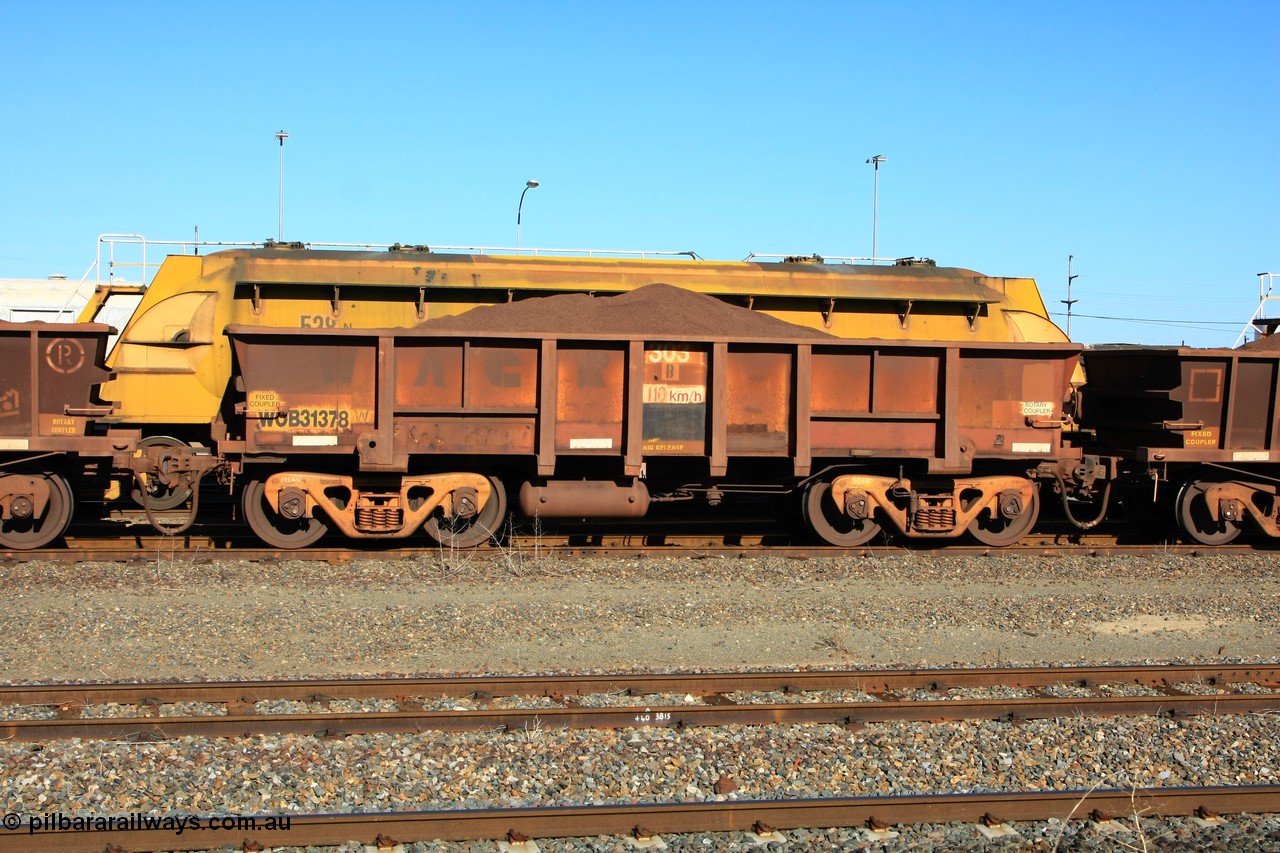 100602 8697
WOB type iron ore waggon WOB 31378 is one of a batch of twenty five built by Comeng WA between 1974 and 1975 and converted from Mt Newman high sided waggons by WAGR Midland Workshops with a capacity of 67 tons with fleet number 303 for Koolyanobbing iron ore operations, loaded with fines, West Kalgoorlie 2nd June 2010.
Keywords: WOB-type;WOB31378;Comeng-WA;Mt-Newman-Mining;