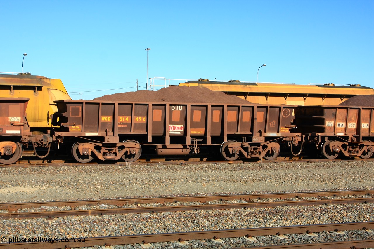 100602 8698
WOD type iron ore waggon WOD 31447 is one of a batch of sixty two built by Goninan WA between April and August 2000 with serial number 950086-019 and fleet number 510 for Koolyanobbing iron ore operations with a 75 ton capacity and a build date of 05/2000, for Portman Mining to cart their Koolyanobbing iron ore to Esperance, with the letters now painted over, loaded with fines, West Kalgoorlie 2nd June 2010.
Keywords: WOD-type;WOD31447;Goninan-WA;950086-019;