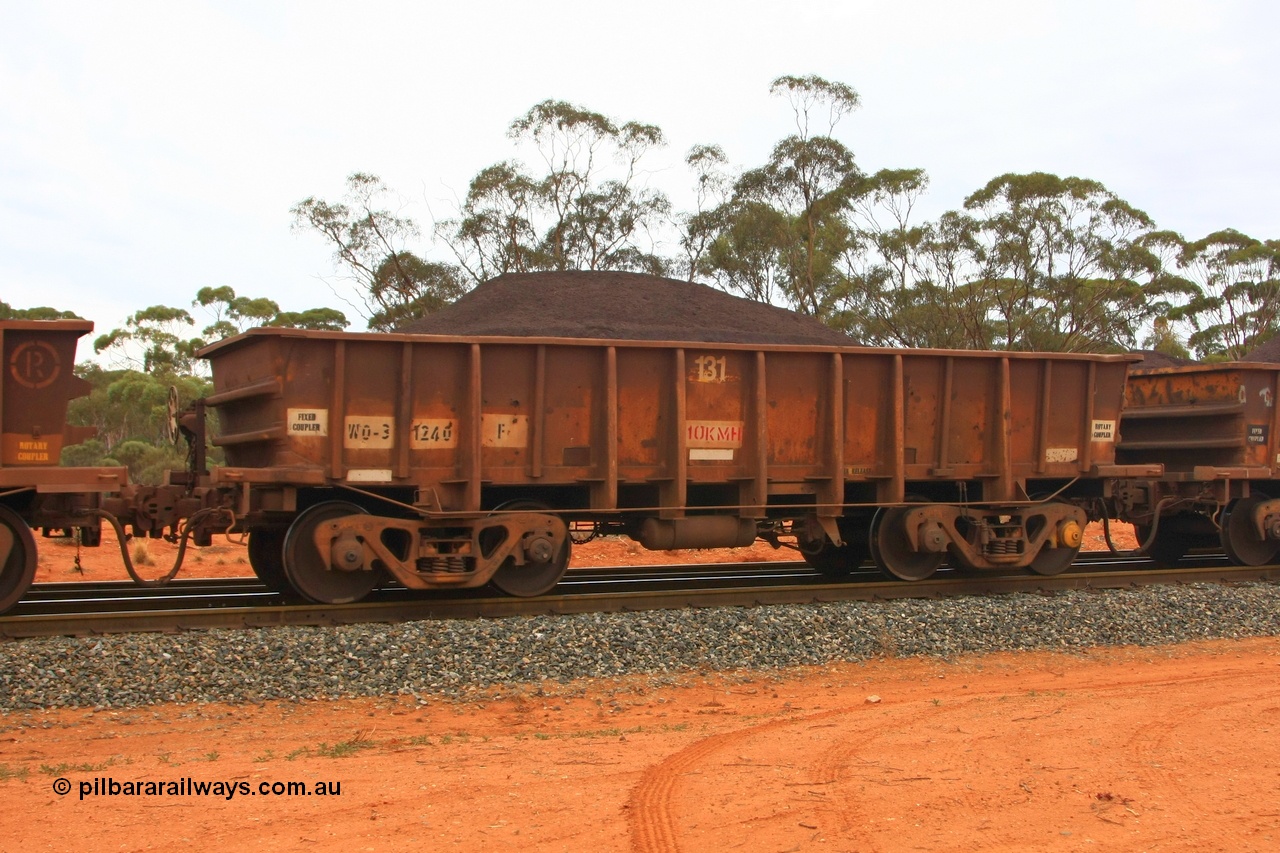 100605 9328
WO type iron ore waggon WO 31240 is one of a batch of eighty six built by WAGR Midland Workshops between 1967 and March 1968 with fleet number 131 for Koolyanobbing iron ore operations, with a 75 ton and 1018 ft³ capacity, Binduli Triangle, loaded with fines, 5th June 2010. This unit was converted to WOC for coal in 1986 till 1994 when it was re-classed back to WO.
Keywords: WO-type;WO31240;WAGR-Midland-WS;