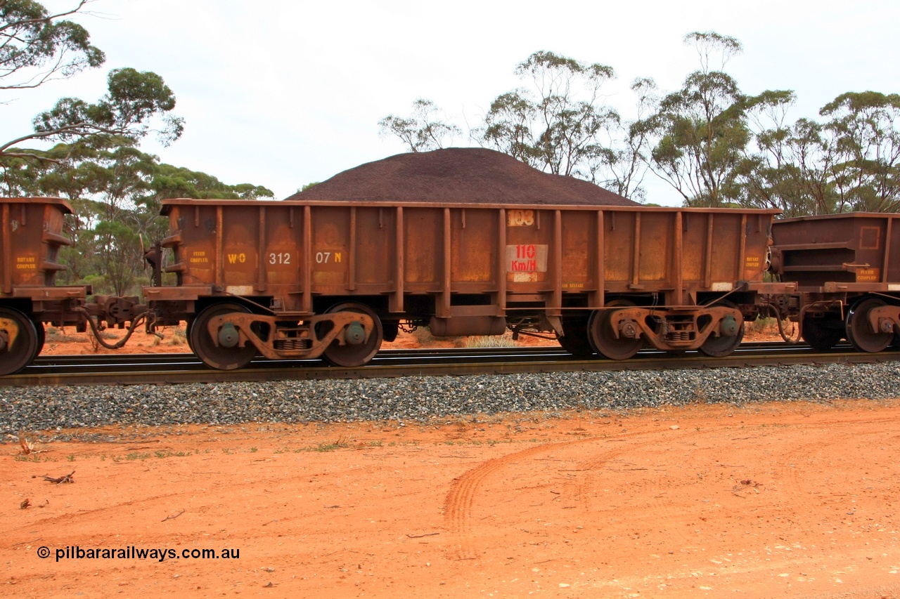 100605 9332
WO type iron ore waggon WO 31207 is one of a batch of eighty six built by WAGR Midland Workshops between 1967 and March 1968 with fleet number 103 for Koolyanobbing iron ore operations, with a 75 ton and 1018 ft.³ capacity, Binduli Triangle, loaded with fines, 5th June 2010. This unit was converted to WOS superphosphate in the late 1980s till 1994 when it was re-classed back to WO.
Keywords: WO-type;WO31207;WAGR-Midland-WS;WOS-type;