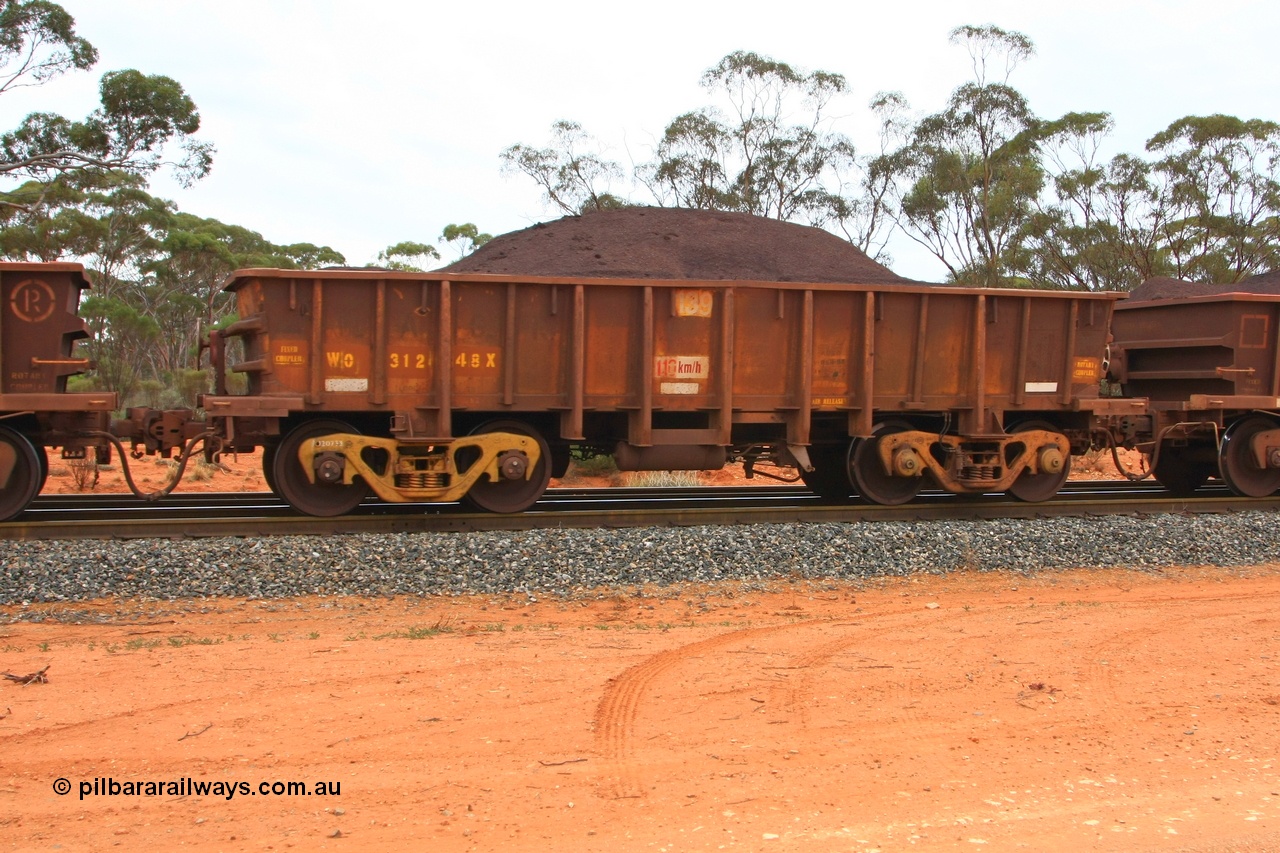 100605 9339
WO type iron ore waggon WO 31248 is one of a batch of eighty six built by WAGR Midland Workshops between 1967 and March 1968 with fleet number 139 for Koolyanobbing iron ore operations, with a 75 ton and 1018 ft³ capacity, loaded with fines seen here at Binduli, 5th June 2010. This unit was converted to WOG for gypsum in late 1980s till 1990 then reclassed to WOS for superphosphate before being re-classed back to WO in 1994.
Keywords: WO-type;WO31248;WAGR-Midland-WS;