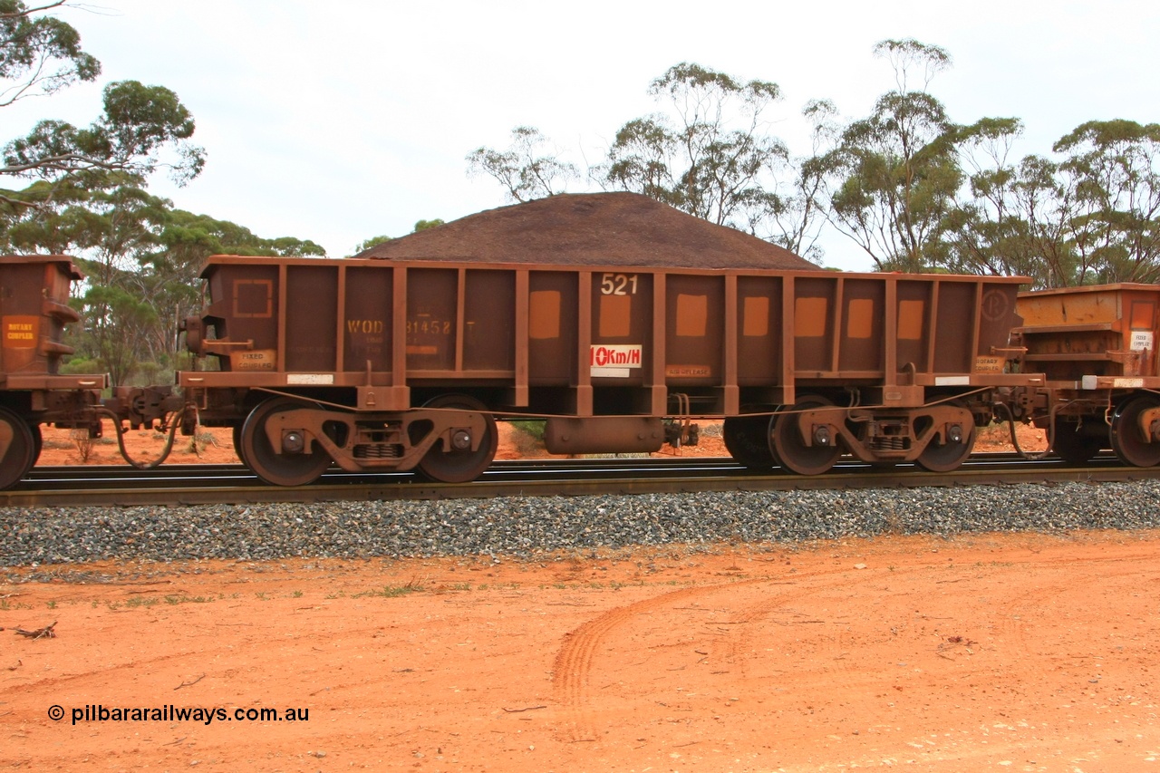 100605 9348
WOD type iron ore waggon WOD 31458 is one of a batch of sixty two built by Goninan WA between April and August 2000 with serial number 950086-030 and fleet number 521 for Koolyanobbing iron ore operations with a 75 ton capacity for Portman Mining to cart their Koolyanobbing iron ore to Esperance, now with PORTMAN painted out, Binduli Triangle, loaded with fines, 5th June 2010.
Keywords: WOD-type;WOD31458;Goninan-WA;950086-030;