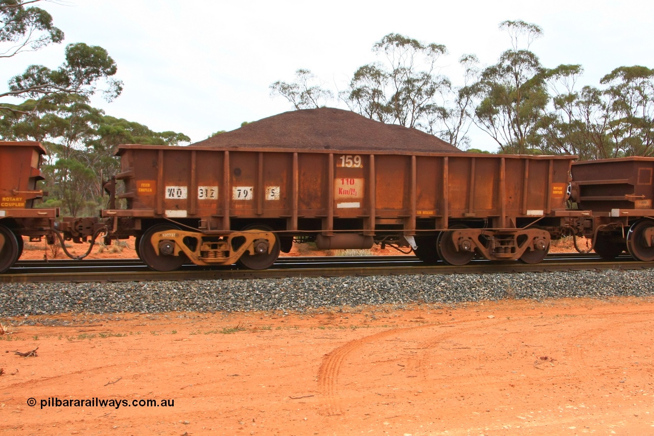 100605 9349
WO type iron ore waggon WO 31279 is one of a batch of eighty six built by WAGR Midland Workshops between 1967 and March 1968 with fleet number 159 for Koolyanobbing iron ore operations, with a 75 ton and 1018 ft³ capacity, Binduli Triangle, loaded with fines, 5th June 2010. This unit was converted to WOC for coal in 1986 till 1994 when it was re-classed back to WO.
Keywords: WO-type;WO31279;WAGR-Midland-WS;