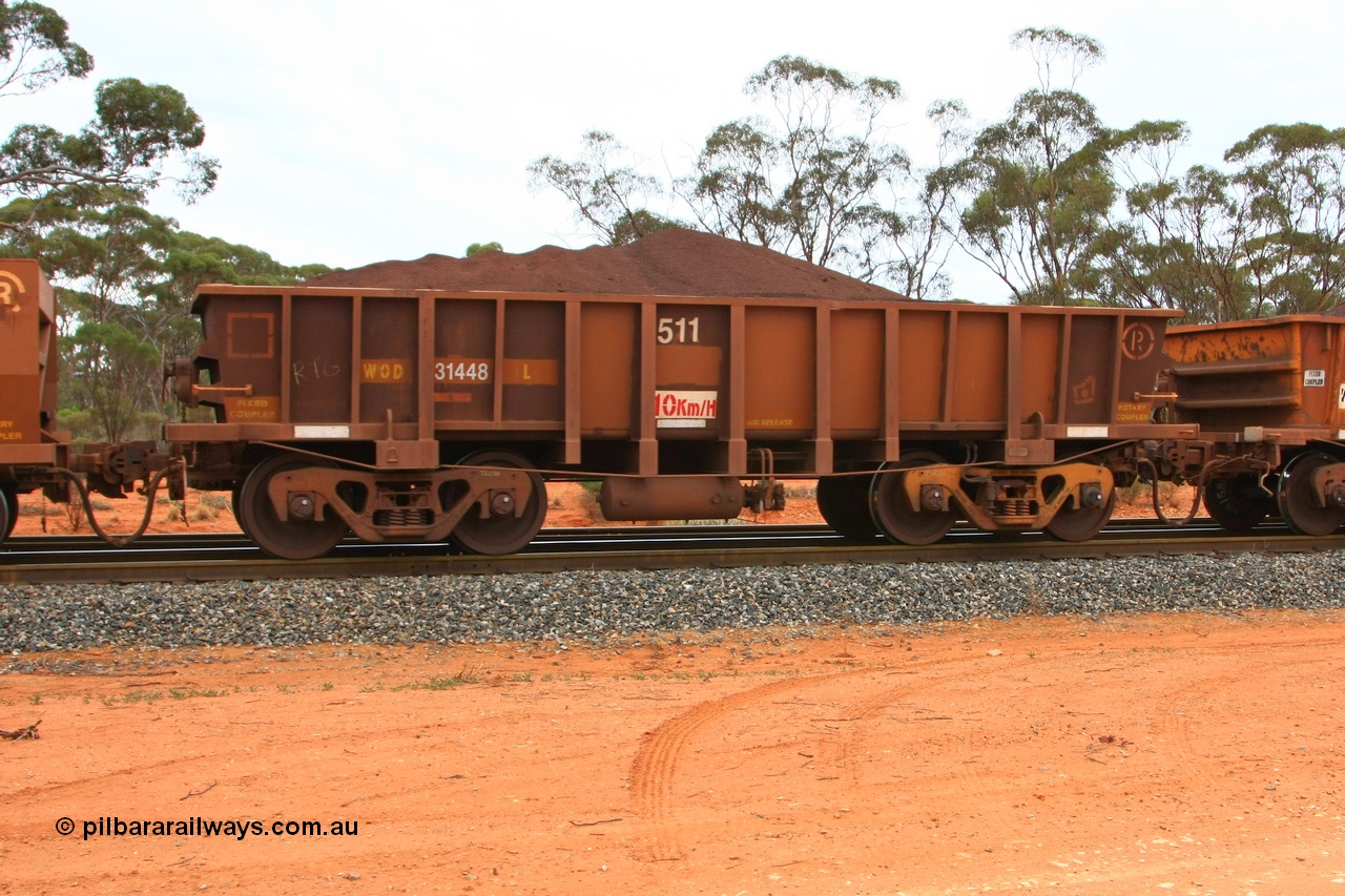 100605 9352
WOD type iron ore waggon WOD 31448 is one of a batch of sixty two built by Goninan WA between April and August 2000 with serial number 950086-020 and fleet number 511 for Koolyanobbing iron ore operations with a 75 ton capacity for Portman Mining to cart their Koolyanobbing iron ore to Esperance, now with PORTMAN painted out, Binduli Triangle, loaded with fines, 5th June 2010.
Keywords: WOD-type;WOD31448;Goninan-WA;950086-020;