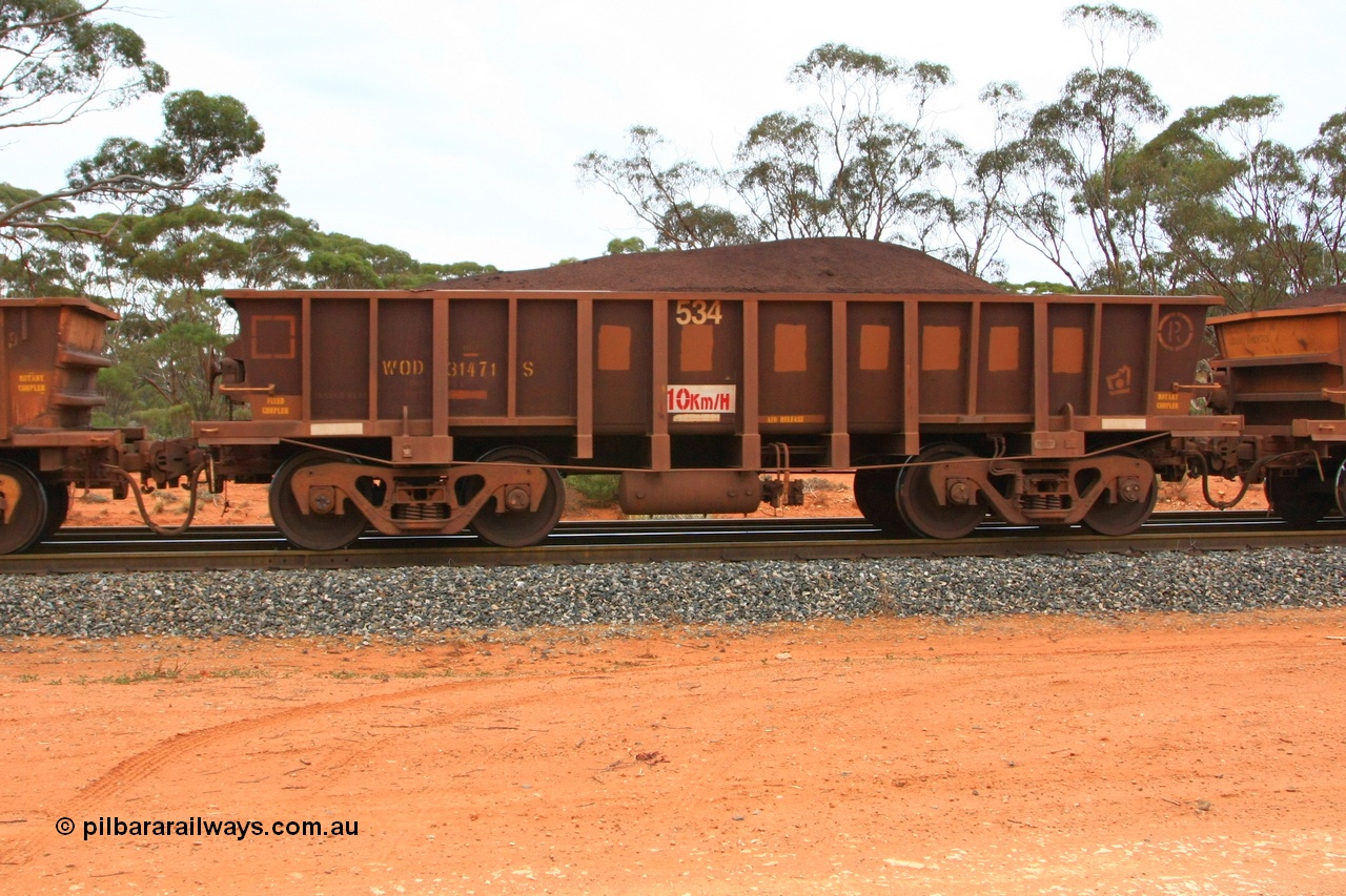 100605 9369
WOD type iron ore waggon WOD 31471 is one of a batch of sixty two built by Goninan WA between April and August 2000 with serial number 950086-043 and fleet number 534 for Koolyanobbing iron ore operations with a 75 ton capacity for Portman Mining to cart their Koolyanobbing iron ore to Esperance, now with PORTMAN painted out, Binduli Triangle, loaded with fines, 5th June 2010.
Keywords: WOD-type;WOD31471;Goninan-WA;950086-043;