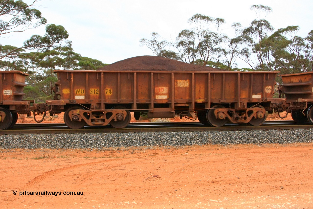 100605 9376
WO type iron ore waggon WO 31274 is one of a batch of eighty six built by WAGR Midland Workshops between 1967 and March 1968 with fleet number 156 for Koolyanobbing iron ore operations, with a 75 ton and 1018 ft³ capacity, Binduli Triangle, loaded with fines, 5th June 2010.
Keywords: WO-type;WO31274;WAGR-Midland-WS;