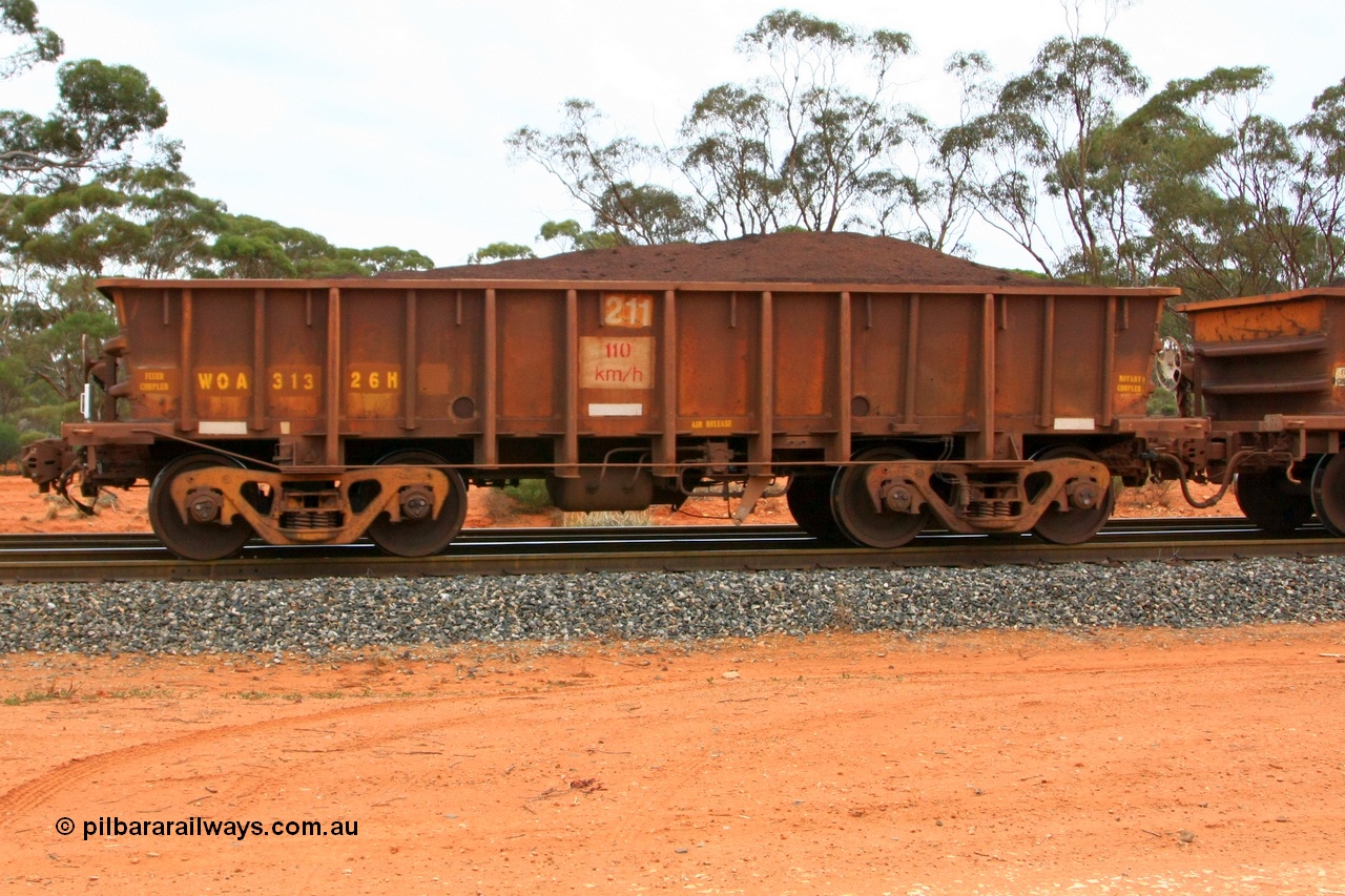 100605 9378
WOA type iron ore waggon WOA 31326 is one of a batch of thirty nine built by WAGR Midland Workshops between 1970 and 1971 with fleet number 211 for Koolyanobbing iron ore operations, with a 75 ton and 1018 ft³ capacity, Binduli Triangle, loaded with fines, 5th June 2010.
Keywords: WOA-type;WOA31326;WAGR-Midland-WS;
