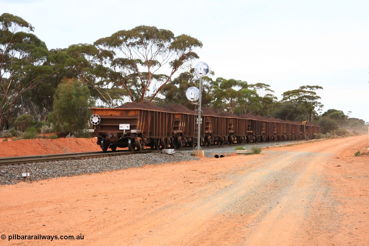 100605 9379
WOA type iron ore waggon WOA 31326 is one of a batch of thirty nine built by WAGR Midland Workshops between 1970 and 1971 with fleet number 211 for Koolyanobbing iron ore operations, with a 75 ton and 1018 ft³ capacity, trailing view with EoT device and loaded ore train departing Binduli Triangle, 5th June 2010.
Keywords: WOA-type;WOA31326;WAGR-Midland-WS;