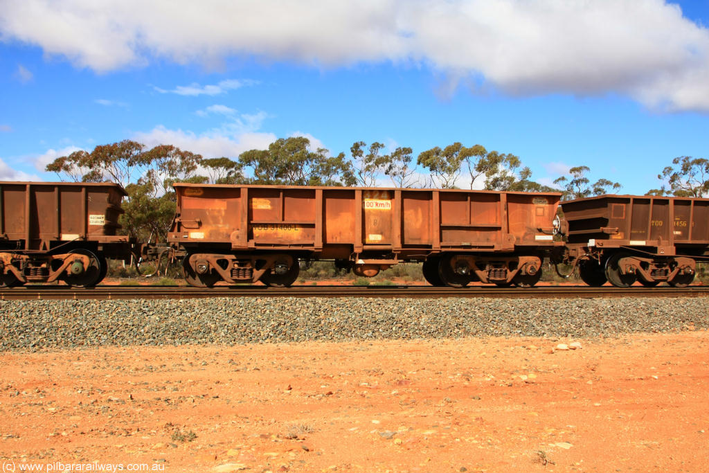 100729 01490
WOB type iron ore waggon WOB 31400 is one of a batch of twenty five built by Comeng WA between 1974 and 1975 and converted from Mt Newman high sided waggons by WAGR Midland Workshops with a capacity of 67 tons with fleet number 324 for Koolyanobbing iron ore operations. This waggon was also converted to a WSM type ballast hopper by re-fitting the cut down top section and having bottom discharge doors fitted, converted back to WOB in 1998, on a loaded train at Binduli, 29th July 2010.
Keywords: WOB-type;WOB31400;Comeng-WA;WSM-type;Mt-Newman-Mining;
