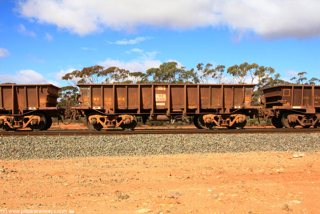 100729 01493
WO type iron ore waggon WO 31281 is one of a batch of eighty six built by WAGR Midland Workshops between 1967 and March 1968 with fleet number 161 for Koolyanobbing iron ore operations, with a 75 ton and 1018 ft³ capacity, Binduli Triangle, empty train 29th July 2010. This unit was converted to WOC for coal in 1986 till 1994 when it was re-classed back to WO.
Keywords: WO-type;WO31281;WAGR-Midland-WS;