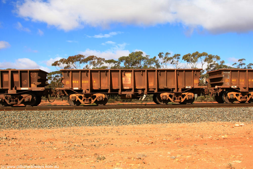 100729 01494
WOA type iron ore waggon WOA 31315 is one of a batch of thirty nine built by WAGR Midland Workshops between 1970 and 1971 with fleet number 208 for Koolyanobbing iron ore operations, with a 75 ton and 1018 ft³ capacity, Binduli Triangle, 29th July 2010.
Keywords: WOA-type;WOA31315;WAGR-Midland-WS;