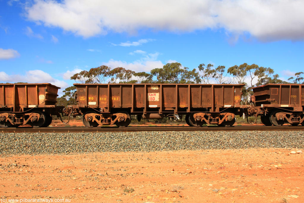 100729 01497
WO type iron ore waggon WO 31278 is one of a batch of eighty six built by WAGR Midland Workshops between 1967 and March 1968 with fleet number 158 for Koolyanobbing iron ore operations, with a 75 ton and 1018 ft³ capacity, Binduli Triangle, 29th July 2010. This unit was converted to WOC for coal in 1986 till 1994 when it was re-classed back to WO.
Keywords: WO-type;WO31278;WAGR-Midland-WS;
