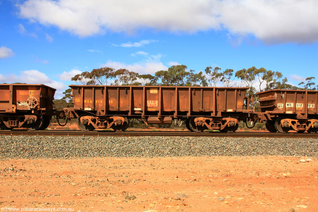 100729 01503
WOA type iron ore waggon WOA 31339 is one of a batch of thirty nine built by WAGR Midland Workshops between 1970 and 1971 with fleet number 217 for Koolyanobbing iron ore operations, with a 75 ton and 1018 ft³ capacity, at Binduli Triangle, 29th July 2010.
Keywords: WOA-type;WOA31339;WAGR-Midland-WS;