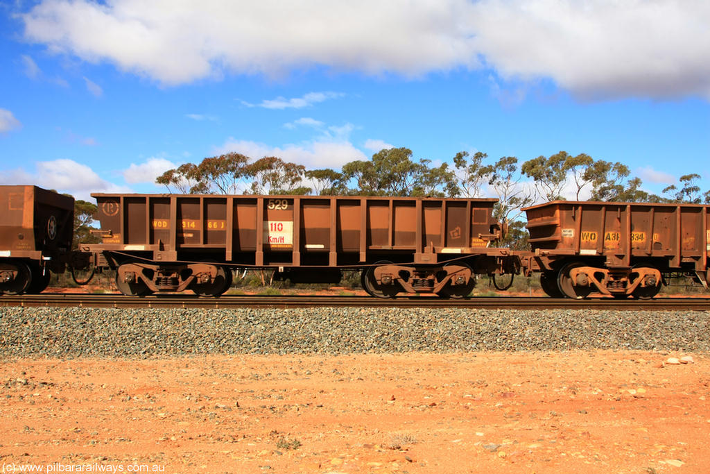 100729 01509
WOD type iron ore waggon WOD 31466 is one of a batch of sixty two built by Goninan WA between April and August 2000 with serial number 950086-038 and fleet number 529 for Koolyanobbing iron ore operations with a 75 ton capacity for Portman Mining to cart their Koolyanobbing iron ore to Esperance, now with PORTMAN painted out, Binduli Triangle, 29th July 2010.
Keywords: WOD-type;WOD31466;Goninan-WA;950086-038;