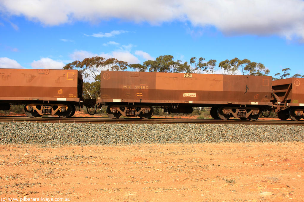 100729 01511
WOE type iron ore waggon WOE 31068 is one of a batch of one hundred and thirty built by Goninan WA between March and August 2001 with serial number 950092-058 and fleet number 654 for Koolyanobbing iron ore operations, at Binduli Triangle, 29th July 2010.
Keywords: WOE-type;WOE31068;Goninan-WA;950092-058;