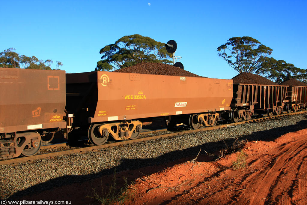 100731 02276
WOE type iron ore waggon WOE 33560 is one of a batch of one hundred and twenty eight built by United Group Rail WA between August 2008 and March 2009 with serial number 950211-100 and fleet number 9050 for Koolyanobbing iron ore operations, on loaded train 6413 at Binduli Triangle, 31st July 2010.
Keywords: WOE-type;WOE33560;United-Group-Rail-WA;950211-100;