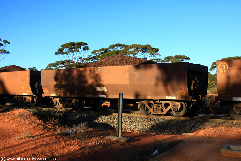 100731 02281
WOE type iron ore waggon WOE 31065 is one of a batch of one hundred and thirty built by Goninan WA between March and August 2001 with serial number 950092-055 and fleet number 651 for Koolyanobbing iron ore operations, on loaded train 6413 at Binduli Triangle, 31st July 2010.
Keywords: WOE-type;WOE31065;Goninan-WA;950092-055;