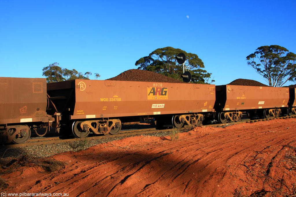 100731 02287
WOE type iron ore waggon WOE 33470 is one of a batch of one hundred and twenty eight built by United Group Rail WA between August 2008 and March 2009 with serial number 950211-012 and fleet number 8970 for Koolyanobbing iron ore operations, the 8 being a addition due to fleet size, build date of 06/2006 with a revised load of 82.5 tonnes, with PORTMAN painted out and an ARG decal applied to the side, on loaded train 6413 at Binduli Triangle, 31st July 2010.
Keywords: WOE-type;WOE33470;United-Group-Rail-WA;950211-012;