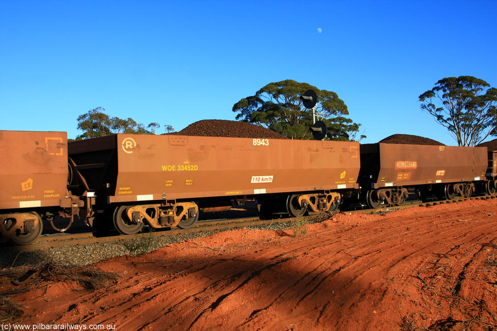 100731 02298
WOE type iron ore waggon WOE 33452 is one of a batch of seventeen built by United Group Rail WA between July and August 2008 with serial number 950209-016 and fleet number 8943 for Koolyanobbing iron ore operations, on loaded train 6413 at Binduli Triangle, 31st July 2010.
Keywords: WOE-type;WOE33452;United-Group-Rail-WA;950209-016;