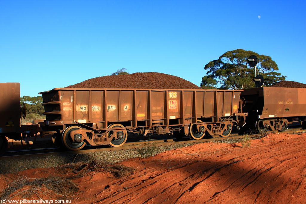 100731 02300
WO type iron ore waggon WO 31405 is one of a batch of eleven replacement waggons built by WAGR Midland Workshops between 1970 and 1971 with fleet number 183 for Koolyanobbing iron ore operations, with a 75 ton and 1018 ft³ capacity, with new wheel sets, on loaded train 6413 at Binduli Triangle, 31st July 2010.
Keywords: WO-type;WO31405;WAGR-Midland-WS;