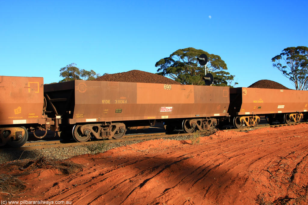 100731 02304
WOE type iron ore waggon WOE 31106 is one of a batch of one hundred and thirty built by Goninan WA between March and August 2001 with serial number 950092-096 and fleet number 690 for Koolyanobbing iron ore operations, on loaded train 6413 at Binduli Triangle, 31st July 2010.
Keywords: WOE-type;WOE31106;Goninan-WA;950092-096;