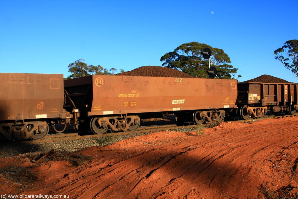 100731 02335
WOE type iron ore waggon WOE 33313 is one of a batch of one hundred and forty one built by United Goninan WA between November 2005 and April 2006 with serial number 950142-018 and fleet number 812 for Koolyanobbing iron ore operations, on loaded train 6413 at Binduli Triangle, 31st July 2010.
Keywords: WOE-type;WOE33313;United-Goninan-WA;950142-018;