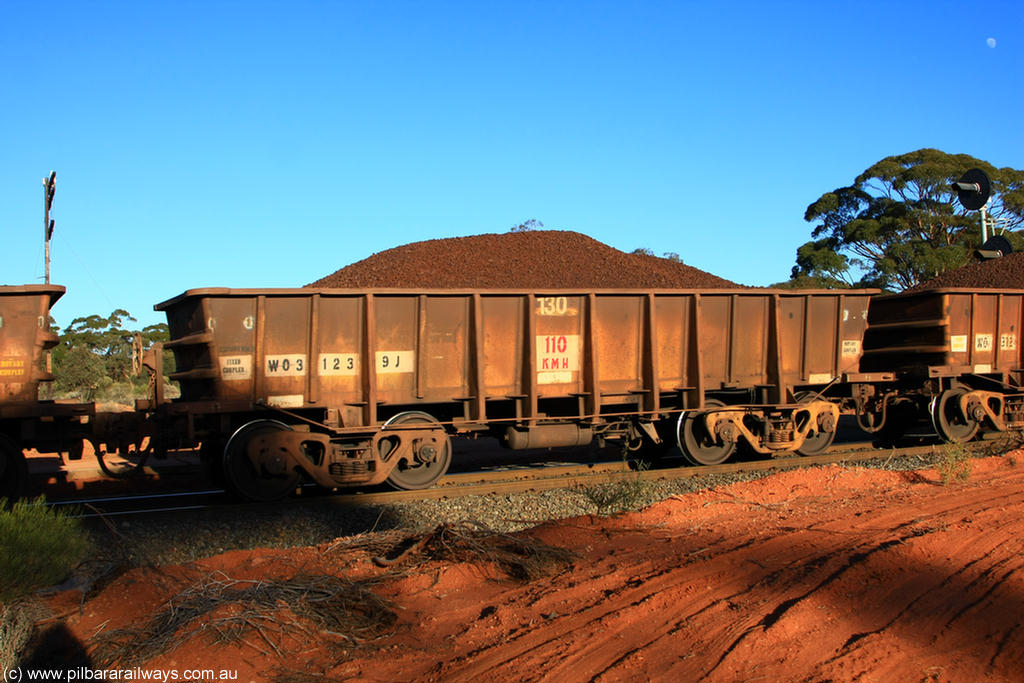 100731 02344
WO type iron ore waggon WO 31239 is one of a batch of eighty six built by WAGR Midland Workshops between 1967 and March 1968 with fleet number 130 for Koolyanobbing iron ore operations, with a 75 ton and 1018 ft³ capacity, on loaded train 6413 at Binduli Triangle, 31st July 2010. This unit was converted to WOC for coal in 1986 till 1994 when it was re-classed back to WO.
Keywords: WO-type;WO31239;WAGR-Midland-WS;