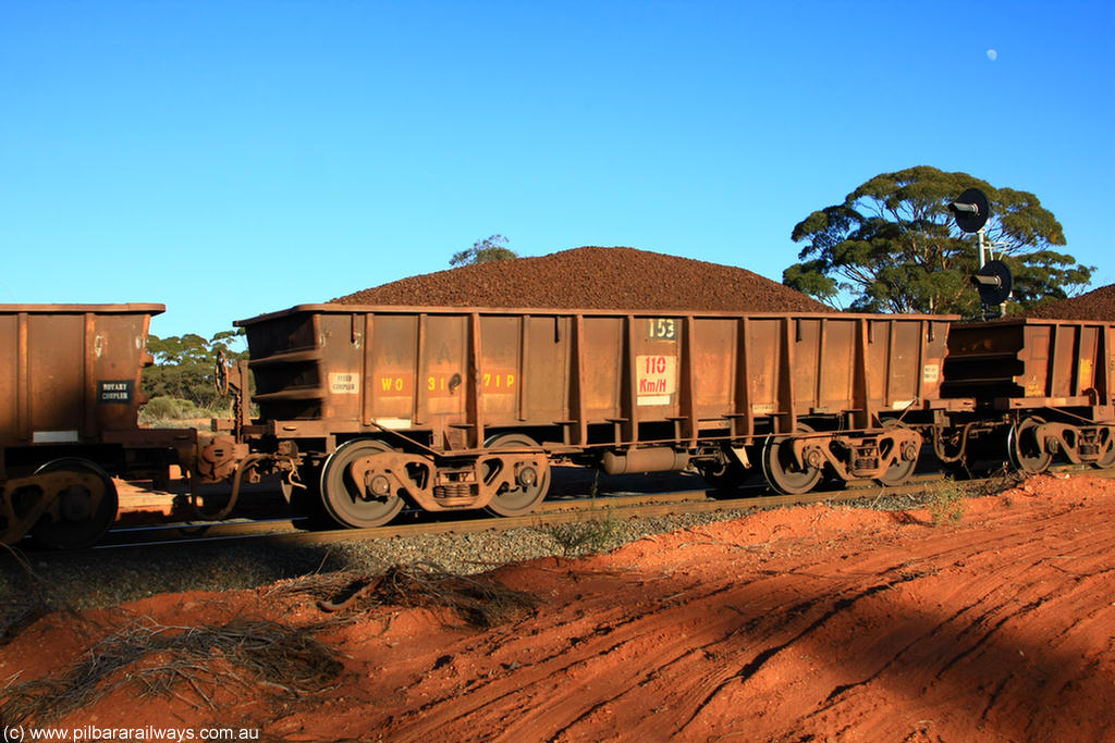 100731 02348
WO type iron ore waggon WO 31271 is one of a batch of eighty six built by WAGR Midland Workshops between 1967 and March 1968 with fleet number 153 for Koolyanobbing iron ore operations, with a 75 ton and 1018 ft³ capacity, on loaded train 6413 at Binduli Triangle, 31st July 2010. This unit was converted to WOS superphosphate in the late 1980s till 1994 when it was re-classed back to WO.
Keywords: WO-type;WO31271;WAGR-Midland-WS;WOS-type;