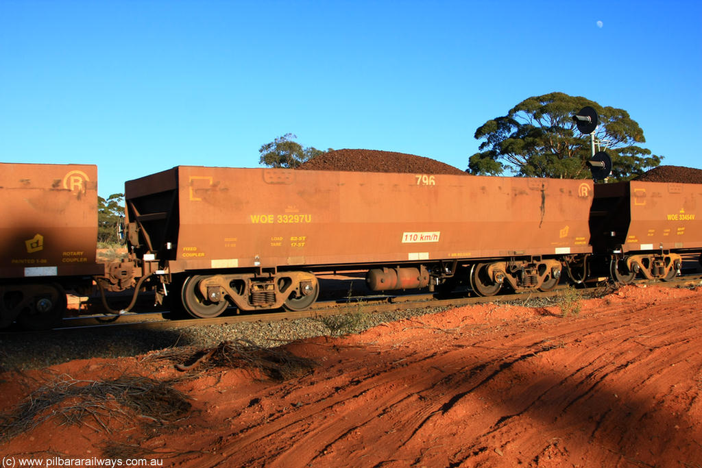 100731 02365
WOE type iron ore waggon WOE 33297 is one of a batch of one hundred and forty one built by United Goninan WA between November 2005 and April 2006 with serial number 950142-002 and fleet number 796 for Koolyanobbing iron ore operations, on loaded train 6413 at Binduli Triangle, 31st July 2010.
Keywords: WOE-type;WOE33297;United-Goninan-WA;950142-002;