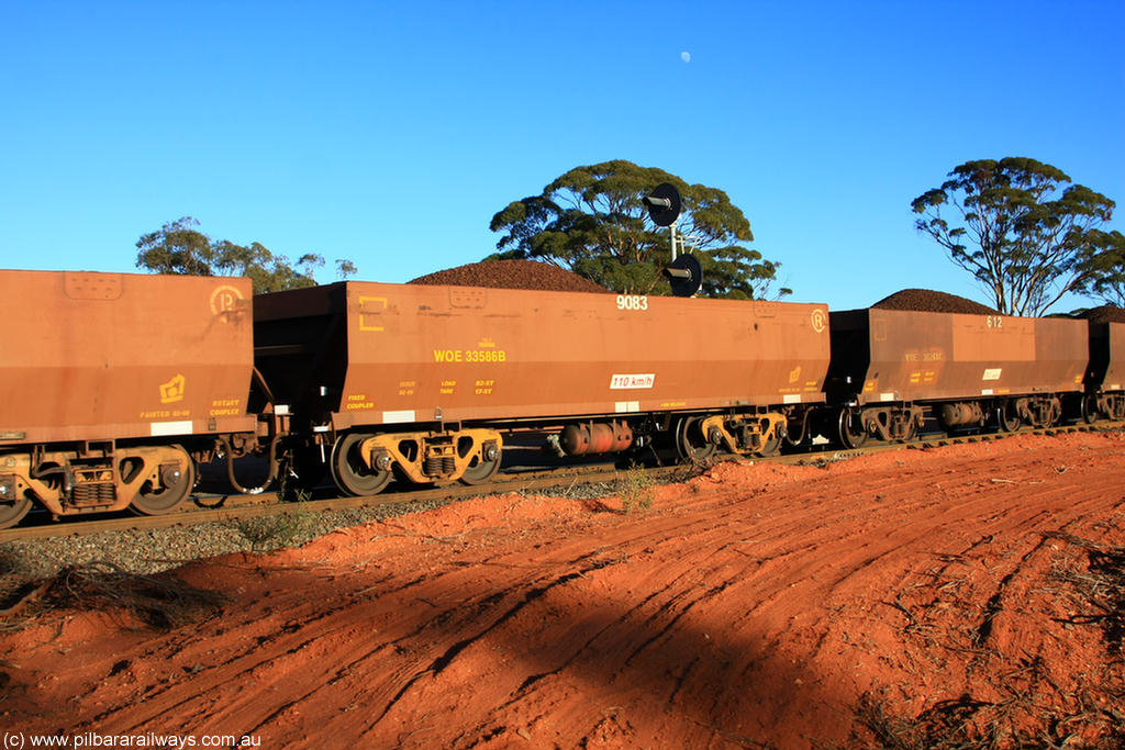 100731 02369
WOE type iron ore waggon WOE 33586 is one of a batch of one hundred and twenty eight built by United Group Rail WA between August 2008 and March 2009 with serial number 950211-126 and fleet number 9083 for Koolyanobbing iron ore operations, on loaded train 6413 at Binduli Triangle, 31st July 2010.
Keywords: WOE-type;WOE33586;United-Group-Rail-WA;950211-126;