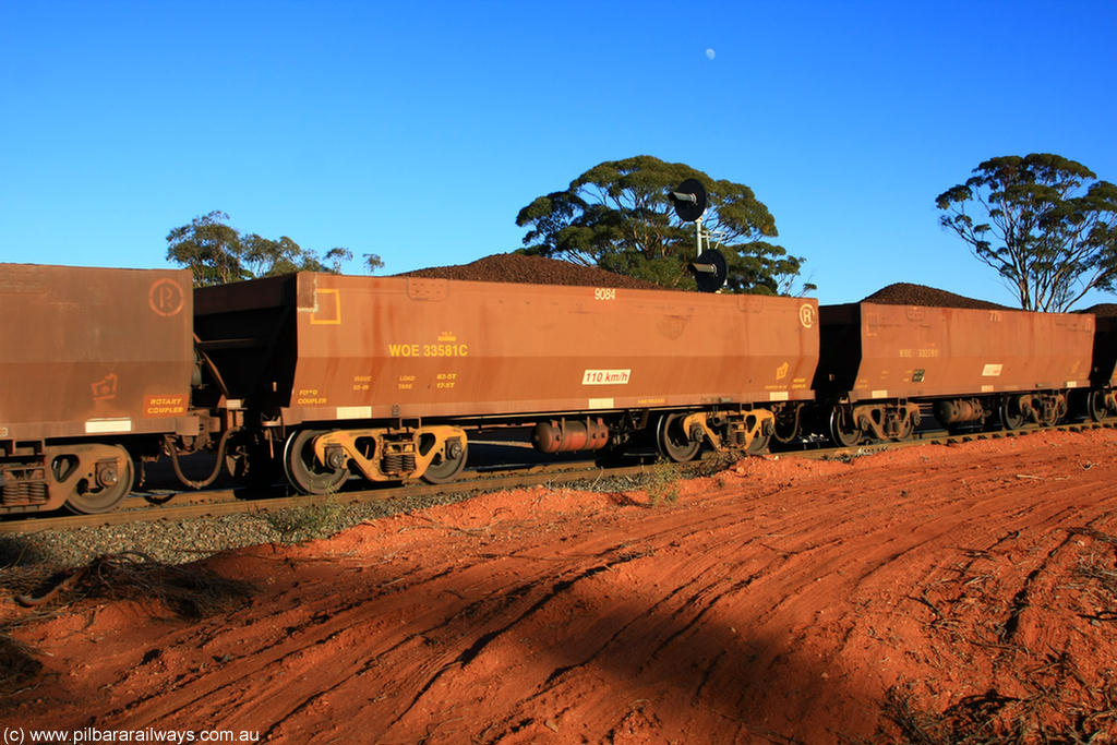 100731 02379
WOE type iron ore waggon WOE 33581 is one of a batch of one hundred and twenty eight built by United Group Rail WA between August 2008 and March 2009 with serial number 950211-121 and fleet number 9084 for Koolyanobbing iron ore operations, on loaded train 6413 at Binduli Triangle, 31st July 2010.
Keywords: WOE-type;WOE33581;United-Group-Rail-WA;950211-121;