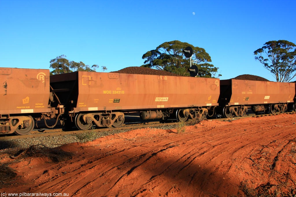 100731 02383
WOE type iron ore waggon WOE 33431 is one of a batch of one hundred and forty one built by United Group Rail WA between November 2005 and April 2006 with serial number 950142-136 and fleet number 8930 for Koolyanobbing iron ore operations, on loaded train 6413 at Binduli Triangle, 31st July 2010.
Keywords: WOE-type;WOE33431;United-Group-Rail-WA;950142-136;