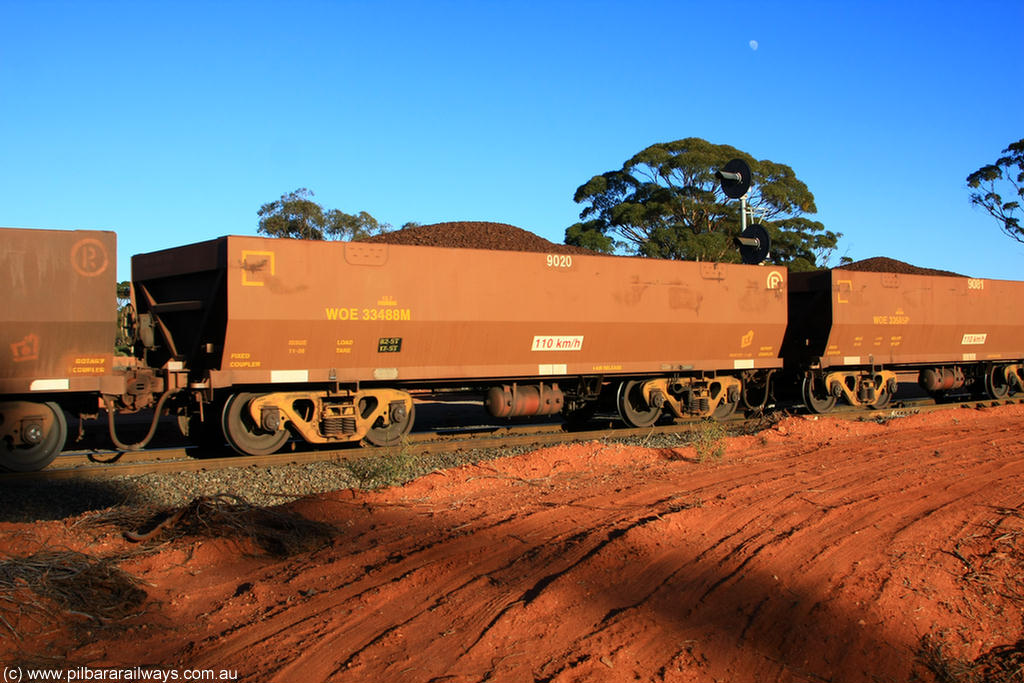100731 02397
WOE type iron ore waggon WOE 33488 is one of a batch of one hundred and twenty eight built by United Group Rail WA between August 2008 and March 2009 with serial number 950211-028 and fleet number 9020 for Koolyanobbing iron ore operations, on loaded train 6413 at Binduli Triangle, 31st July 2010.
Keywords: WOE-type;WOE33488;United-Group-Rail-WA;950211-028;