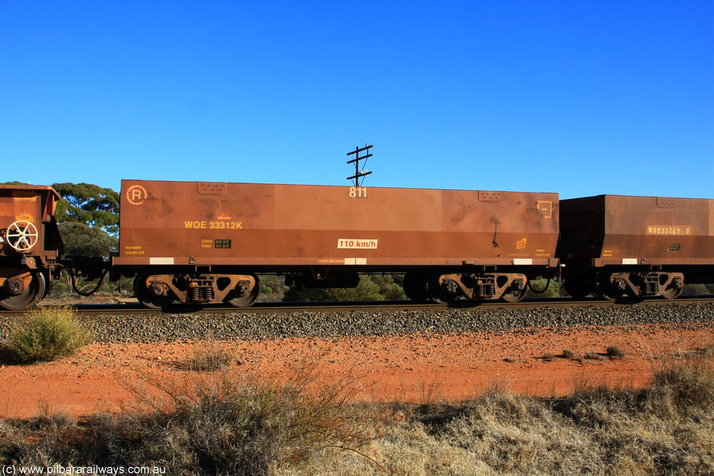100731 02421
WOE type iron ore waggon WOE 33312 is one of a batch of one hundred and forty one built by United Goninan WA between November 2005 and April 2006 with serial number 950142-017 and fleet number 811 for Koolyanobbing iron ore operations, on empty train 6418 at Binduli Triangle, 31st July 2010.
Keywords: WOE-type;WOE33312;United-Goninan-WA;950142-017;