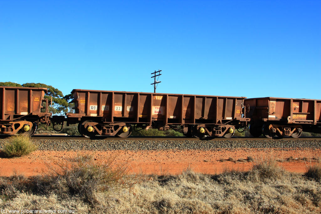 100731 02423
WO type iron ore waggon WO 31222 is one of a batch of eighty six built by WAGR Midland Workshops between 1967 and March 1968 with fleet number 117 for Koolyanobbing iron ore operations, with a 75 ton and 1018 ft³ capacity, on empty train 6418 at Binduli Triangle, 31st July 2010. This unit was converted to WOG for gypsum in late 1980s till 1994 when it was re-classed back to WO.
Keywords: WO-type;WO31222;WAGR-Midland-WS;