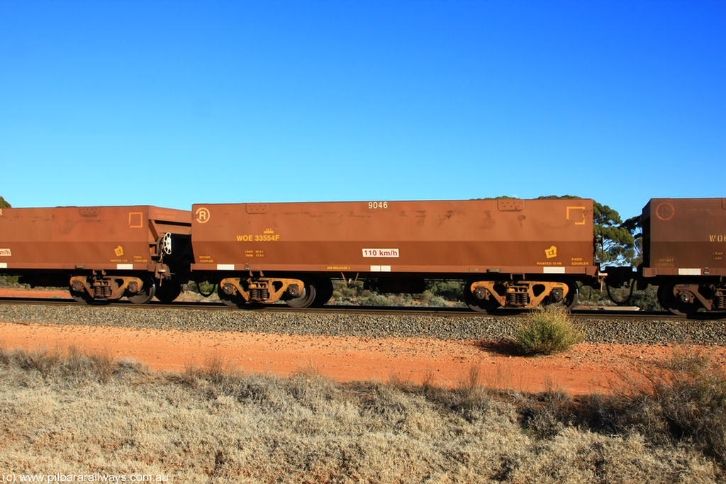 100731 02428
WOE type iron ore waggon WOE 33554 is one of a batch of one hundred and twenty eight built by United Group Rail WA between August 2008 and March 2009 with serial number 950211-094 and fleet number 9046 for Koolyanobbing iron ore operations, on empty train 6418 at Binduli Triangle, 31st July 2010.
Keywords: WOE-type;WOE33554;United-Group-Rail-WA;950211-094;