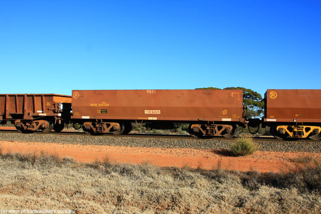 100731 02432
WOE type iron ore waggon WOE 33412 is one of a batch of one hundred and forty one built by United Group Rail WA between November 2005 and April 2006 with serial number 950142-117 and fleet number 8911 for Koolyanobbing iron ore operations, on empty train 6418 at Binduli Triangle, 31st July 2010.
Keywords: WOE-type;WOE33412;United-Group-Rail-WA;950142-117;