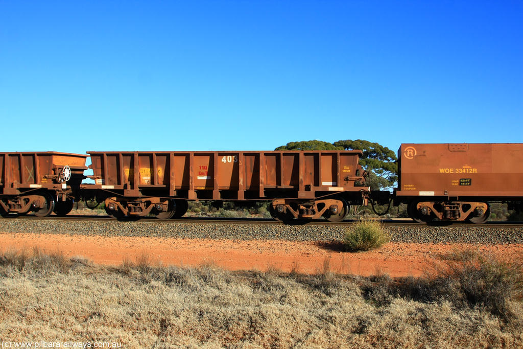 100731 02433
WOC type iron ore waggon WOC 31343 is one of a batch of thirty built by Goninan WA between October 1997 to January 1998 with fleet number 403 for Koolyanobbing iron ore operations with a 75 ton capacity, on empty train 6418 at Binduli Triangle, 31st July 2010.
Keywords: WOC-type;WOC31343;Goninan-WA;