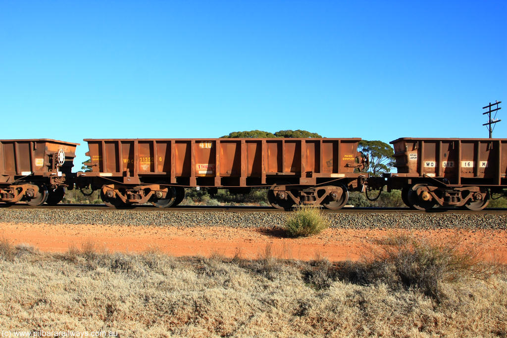 100731 02451
WOC type iron ore waggon WOC 31350 is one of a batch of thirty built by Goninan WA between October 1997 to January 1998 with fleet number 410 for Koolyanobbing iron ore operations with a 75 ton capacity, on empty train 6418 at Binduli Triangle, 31st July 2010.
Keywords: WOC-type;WOC31350;Goninan-WA;