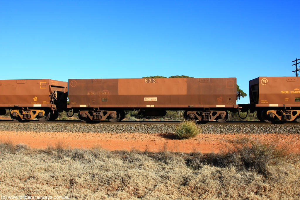 100731 02459
WOE type iron ore waggon WOE 30291 is one of a batch of one hundred and thirty built by Goninan WA between March and August 2001 with serial number 950092-041 and fleet number 633 for Koolyanobbing iron ore operations, on empty train 6418 at Binduli Triangle, 31st July 2010.
Keywords: WOE-type;WOE30291;Goninan-WA;950092-041;