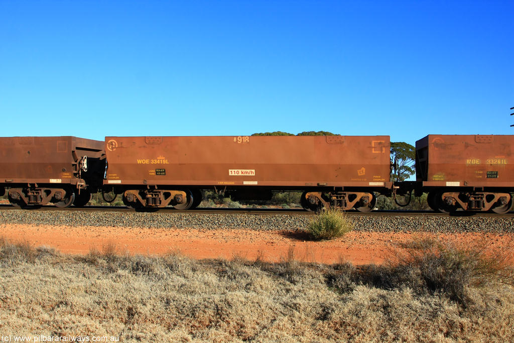 100731 02470
WOE type iron ore waggon WOE 33419 is one of a batch of one hundred and forty one built by United Group Rail WA between November 2005 and April 2006 with serial number 950142-124 and fleet number 8918 for Koolyanobbing iron ore operations, on empty train 6418 at Binduli Triangle, 31st July 2010.
Keywords: WOE-type;WOE33419;United-Group-Rail-WA;950142-124;