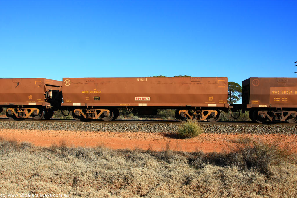 100731 02472
WOE type iron ore waggon WOE 33448 is one of a batch of seventeen built by United Group Rail WA between July and August 2008 with serial number 950209-012 and fleet number 8951 for Koolyanobbing iron ore operations, on empty train 6418 at Binduli Triangle, 31st July 2010.
Keywords: WOE-type;WOE33448;United-Group-Rail-WA;950209-012;