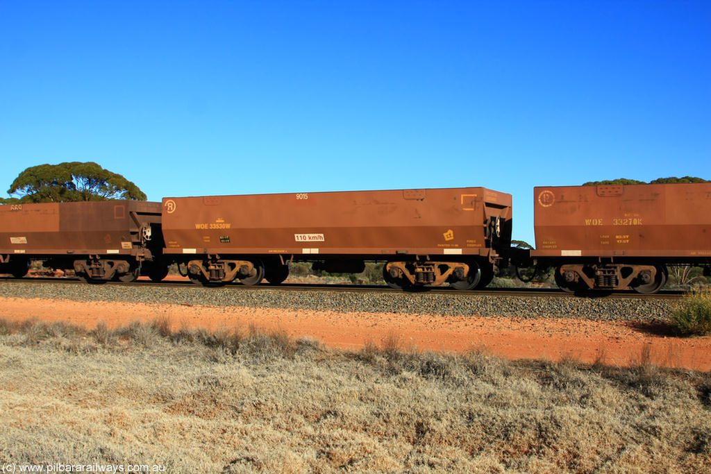 100731 02499
WOE type iron ore waggon WOE 33530 is one of a batch of one hundred and twenty eight built by United Group Rail WA between August 2008 and March 2009 with serial number 950211-070 and fleet number 9015 for Koolyanobbing iron ore operations, on empty train 6418 at Binduli Triangle, 31st July 2010.
Keywords: WOE-type;WOE33530;United-Group-Rail-WA;950211-070;