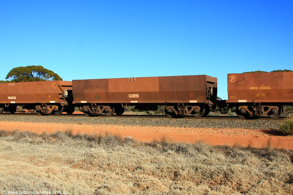 100731 02507
WOE type iron ore waggon WOE 33246 is one of a batch of twenty seven built by Goninan WA between September and October 2002 with serial number and fleet number 745 for Koolyanobbing iron ore operations, on empty train 6418 at Binduli Triangle, 31st July 2010.
Keywords: WOE-type;WOE33246;Goninan-WA;950103-013;