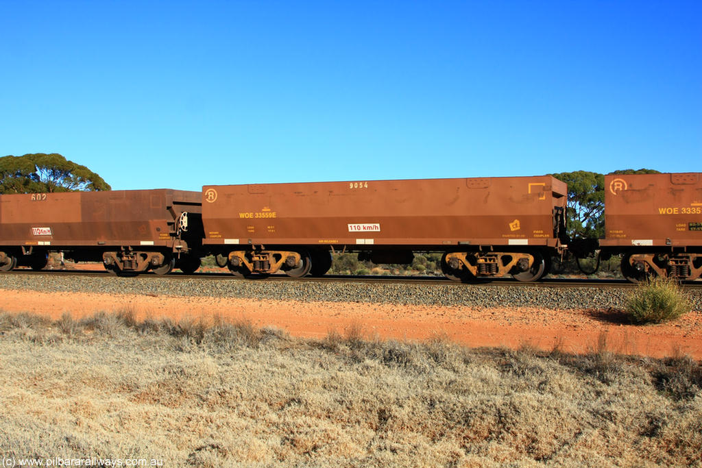 100731 02521
WOE type iron ore waggon WOE 33559 is one of a batch of one hundred and twenty eight built by United Group Rail WA between August 2008 and March 2009 with serial number 950211-099 and fleet number 9054 for Koolyanobbing iron ore operations, on empty train 6418 at Binduli Triangle, 31st July 2010.
Keywords: WOE-type;WOE33559;United-Group-Rail-WA;950211-099;