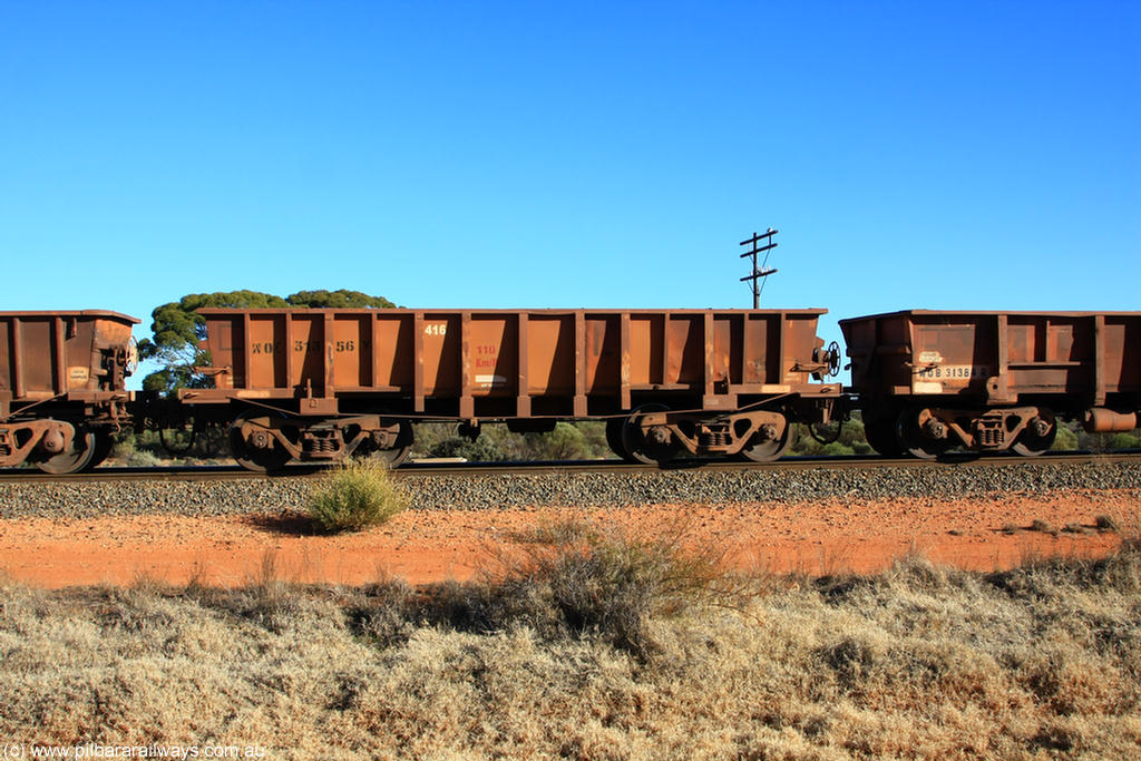 100731 02534
WOC type iron ore waggon WOC 31356 is one of a batch of thirty built by Goninan WA between October 1997 to January 1998 with fleet number 416 for Koolyanobbing iron ore operations with a 75 ton capacity, on empty train 6418 at Binduli Triangle, 31st July 2010.
Keywords: WOC-type;WOC31356;Goninan-WA;