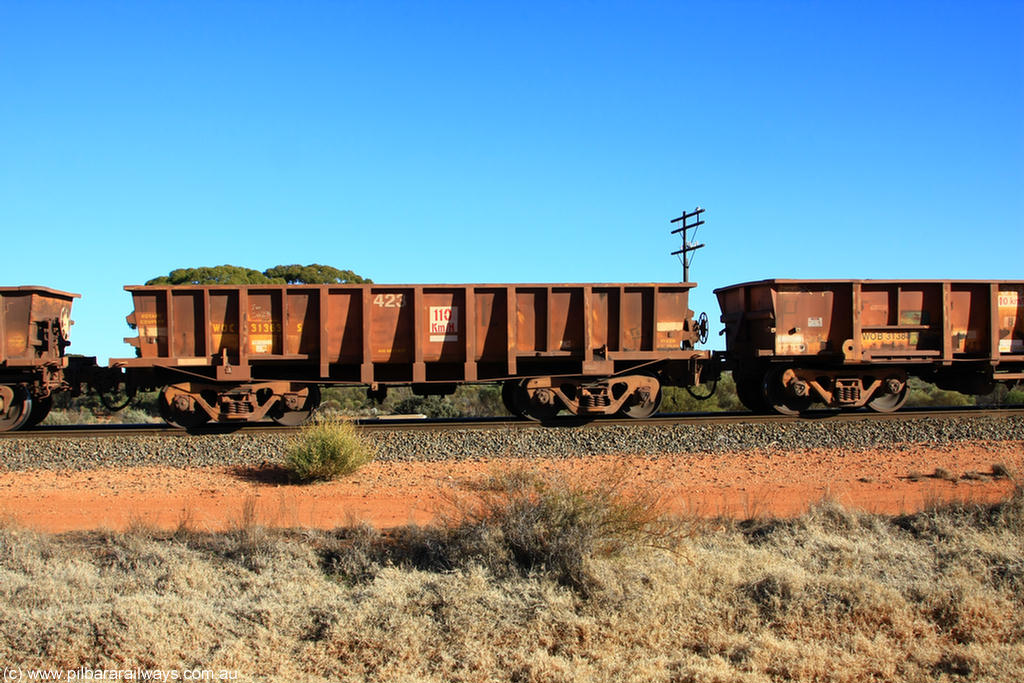 100731 02538
WOC type iron ore waggon WOC 31363 is one of a batch of thirty built by Goninan WA between October 1997 to January 1998 with fleet number 423 for Koolyanobbing iron ore operations with a 75 ton capacity, on empty train 6418 at Binduli Triangle, 31st July 2010.
Keywords: WOC-type;WOC31363;Goninan-WA;